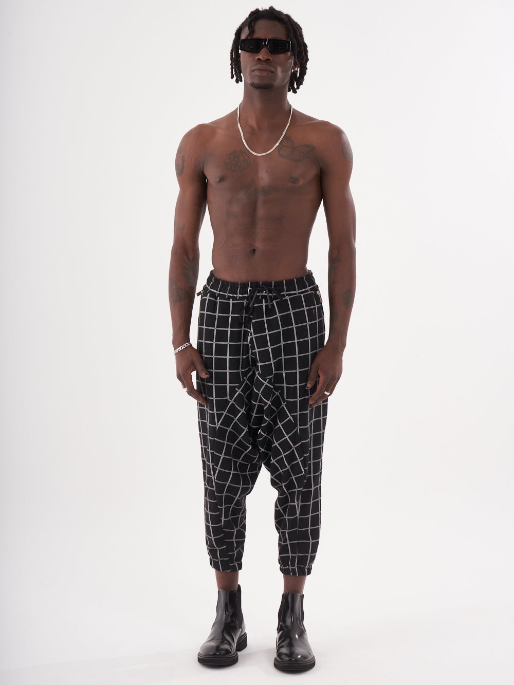 Checkered black WACKADOO JOGGERS.